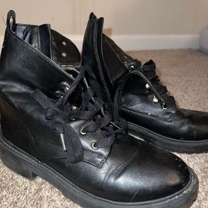 Steve Madden black combat boots.
